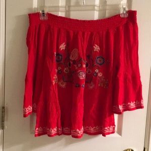 Off the shoulders red top